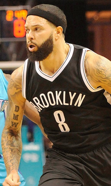 Johnson, Nets catch fire from long range in rout of Hornets